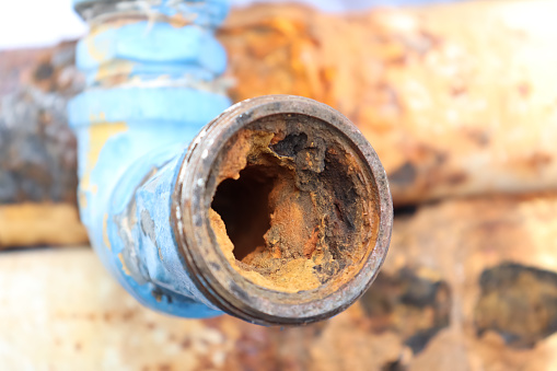 Red rust on the inside old pipe surface