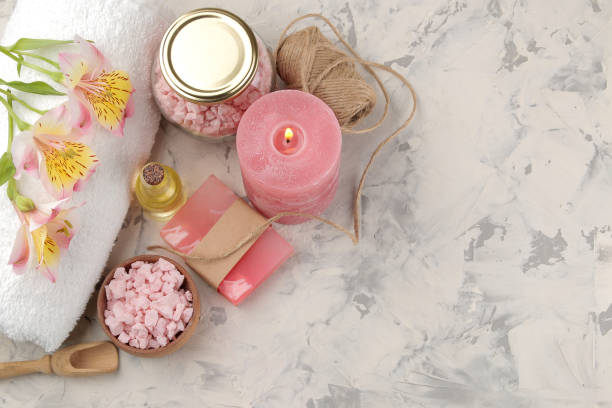 istock Spa composition with sea salt, aroma oils and handmade soap. spa concept. on a light background. view from above. with space for inscription 1325546945