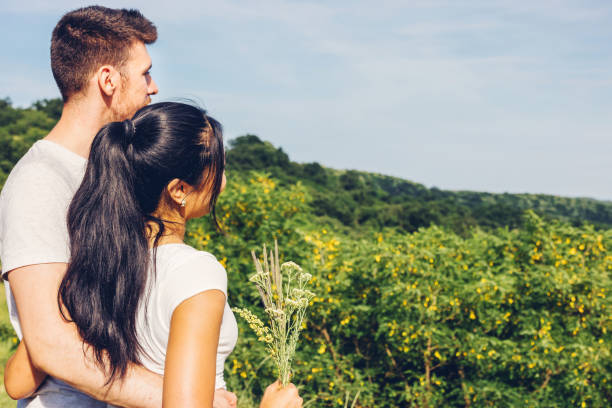 Portrait of a couple from a mountain peak