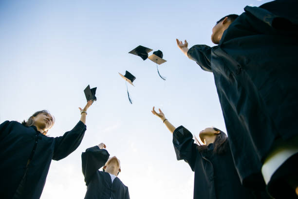 istock Celebrating college graduates 1325555899