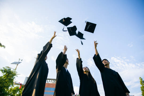 istock College students celebrating their graduation 1325555947