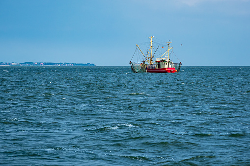 Shrimp boat on the North Sea near island Pellworm, Germany.