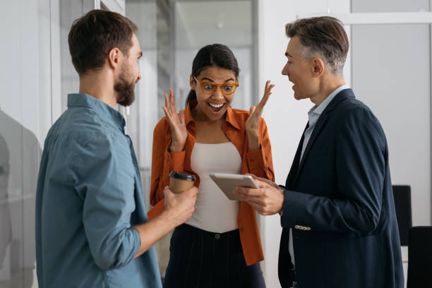 istock Business people meeting planning start up project, sharing creative ideas in office. Emotional woman heard good new, celebration successful deal 1325565918