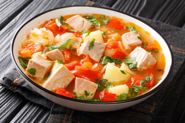 istock Spanish fresh tuna soup with vegetables close-up in a plate. horizontal 1325566646