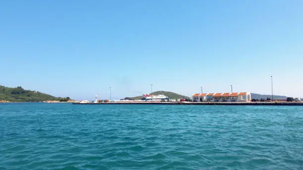 SKIATHOS, GREECE - JULY 2020: Express Skiathos Ferry boat from Hellenic Seaways Ferry company departs from the port of Skiathos island, Sporades, Greece.