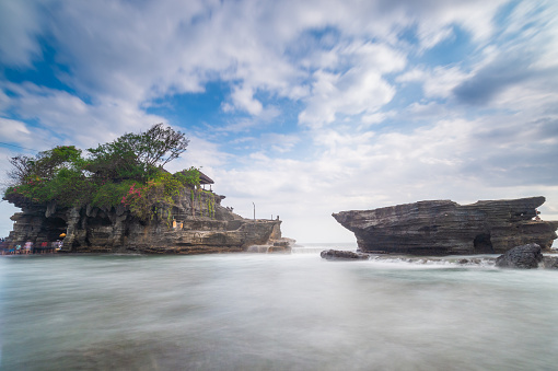 view of Tanah Lot temple and coastline Bali island - Tropical nature landscape of Indonesia, Bali.