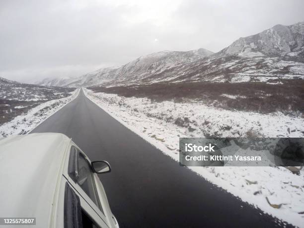 Nature Scene Of Landscape Road On The Snow Mountain From Xiangcheng To Yading National Reserve It Beautiful Road With Snow On The Way Travel Backpack Outdoor Road Trip Stock Photo - Download Image Now