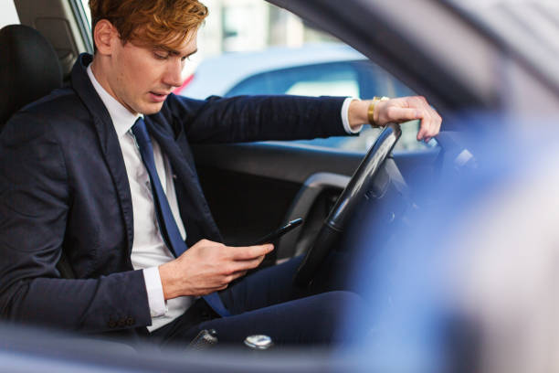 istock Business man portraits: inside a car 1325578284