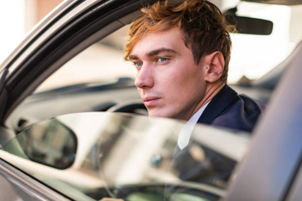 istock Business man portraits: inside a car 1325578347