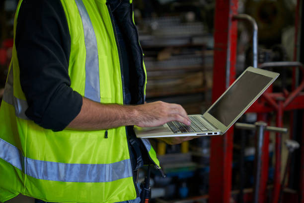 istock Engineer use laptop for check list in manufacture heavy industry 1325579678