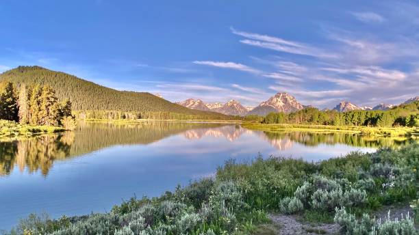 oxbow bend reflecting at dawn - wide angle view hiking the grand teton national park, john d. rockefeller jr. parkway, moose, wy - usa snake river valley grand teton national park stock pictures, royalty-free photos & images