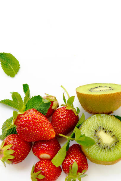 Strawberry and kiwi on an isolated white background.