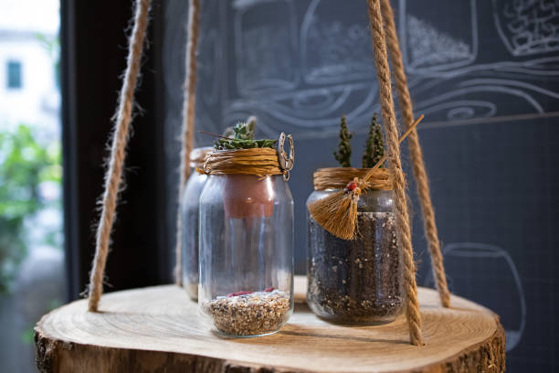 istock Store decoration elements. Glass jar with cactus 1325588098