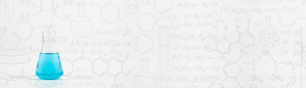 istock A studio photo of a Erlenmeyer Flask,Hand drawn science formulas on chalkboard for background,science laboratory test tubes 1325589998