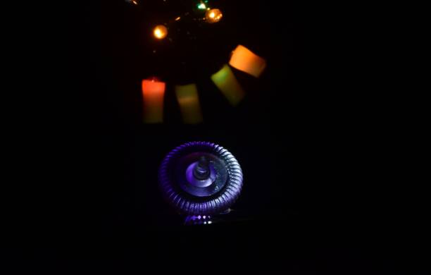 istock Mouse scroller wheel with lights background photo 1325590132