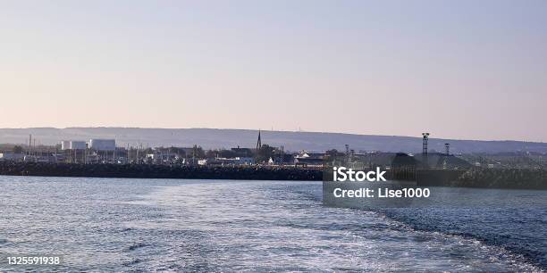 As You Leave On The Boat Look Out Over The City Stock Photo - Download Image Now - Architecture, Blue, Brick