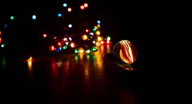 istock Traditional marble balls with black background photo 1325593245