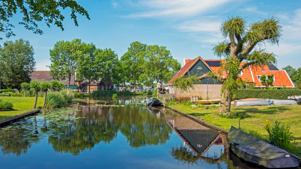 istock Typical dutch summer landscape in the countryside from the Netherlands 1325594287
