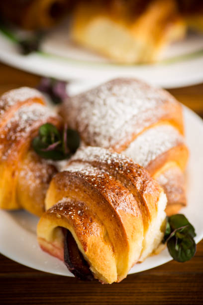 istock baked sweet homemade buns with plum inside 1325598489