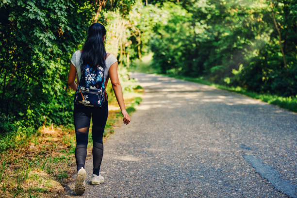 istock Woman starting the forest trek 1325600282