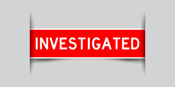 istock Inserted red color label sticker with word investigated on gray background 1325602476