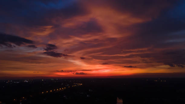 picture of the evening sky in the colorful capital city - color image light pink dramatic sky imagens e fotografias de stock