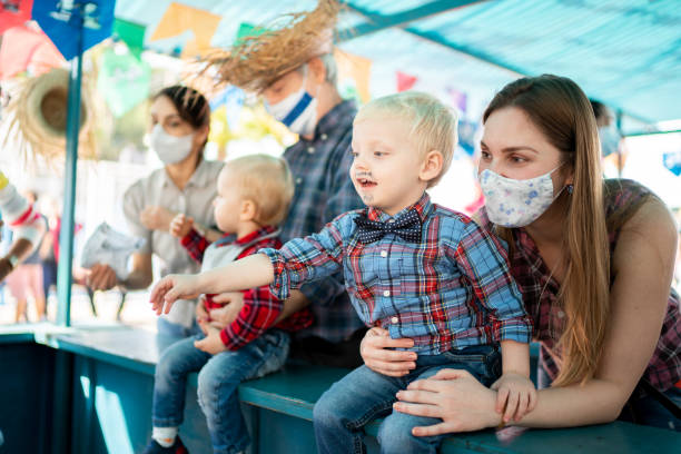 istock Happy baby boys playing during June Party (Festa Junina) 1325607859