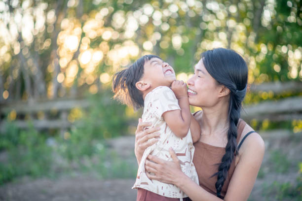 istock Mother and son playing outside in the summertime 1325618719