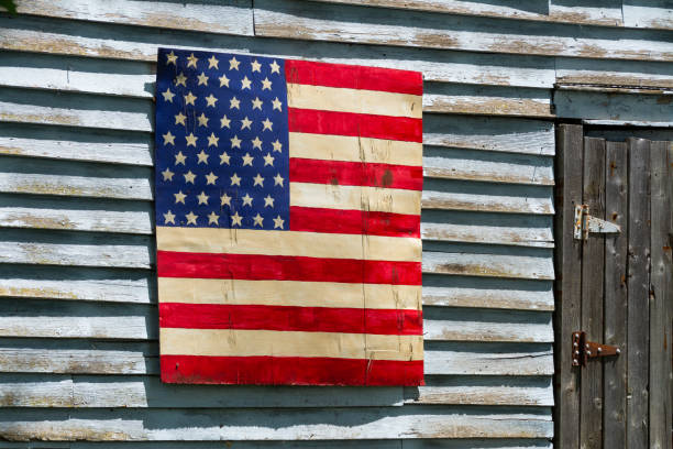 istock American flag on barn. 1325618853