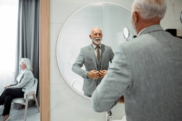 istock Businessman dressing up in bathroom while wife is waiting 1325620794