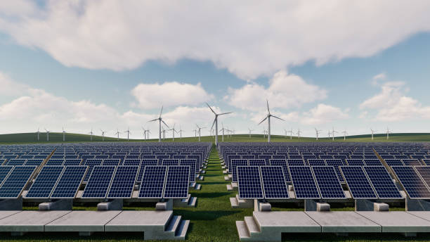 istock Rows of Solar Panels and Wind Turbines on the Plain 1325623270
