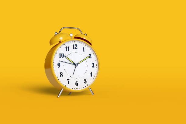 istock Alarm clock isolated on yellow background with copy space. 3d illustration. 1325627176