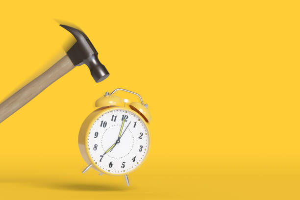 Hammer hitting an alarm clock with motion blur and copy space. 3d illustration. Hammer hitting an alarm clock with motion blur and copy space. 3d illustration. alarm clock snooze stock pictures, royalty-free photos & images