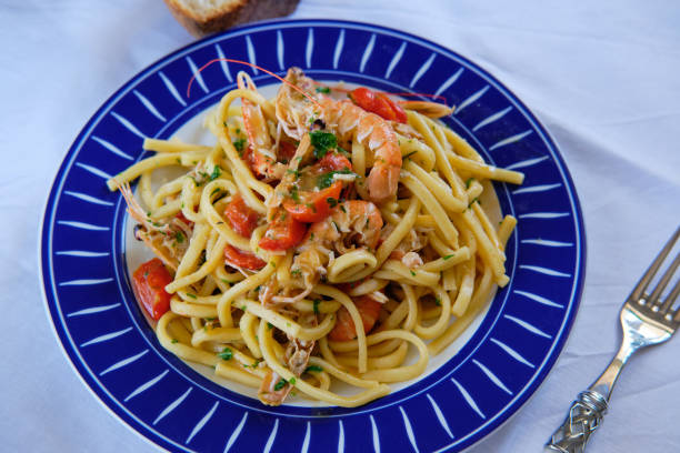 istock Scialatielli Pasta with Shrimp Scampi and tomatoes 1325627498