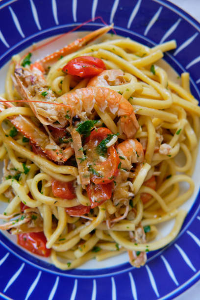 istock Scialatielli Pasta with Shrimp Scampi and tomatoes 1325628023