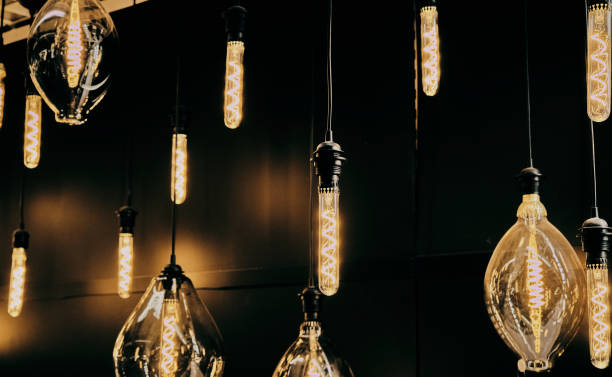 istock Background of decorative light bulbs with an incandescent spiral 1325639861