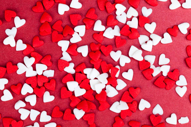 istock red and white sweet heart shaped candies 1325646066