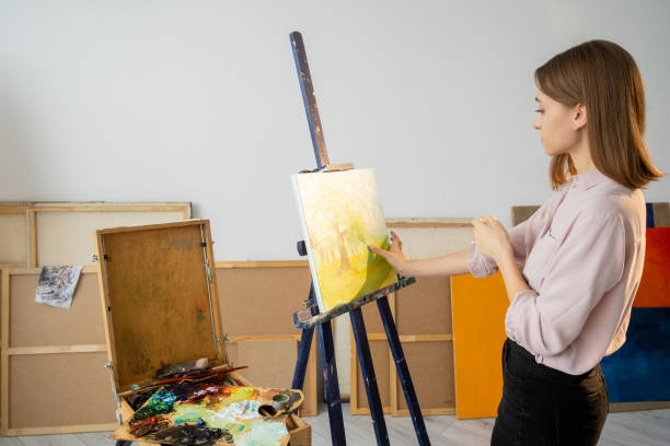istock hand painting visual art artist working in studio 1325652589