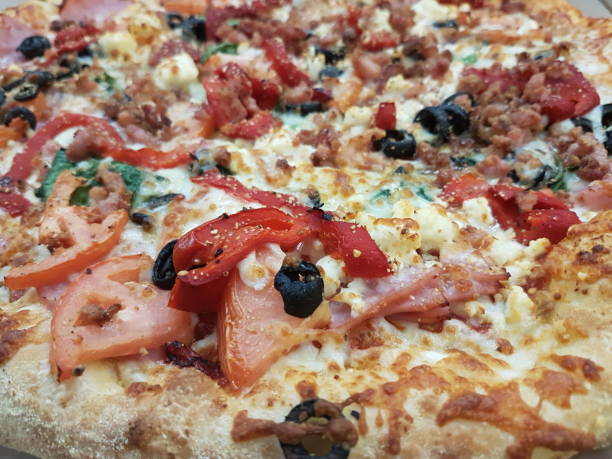 istock Home made vegie and peperoni pizza 1325656170