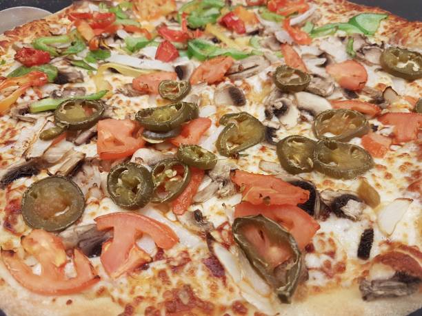 istock Home made vegie and peperoni pizza 1325656508