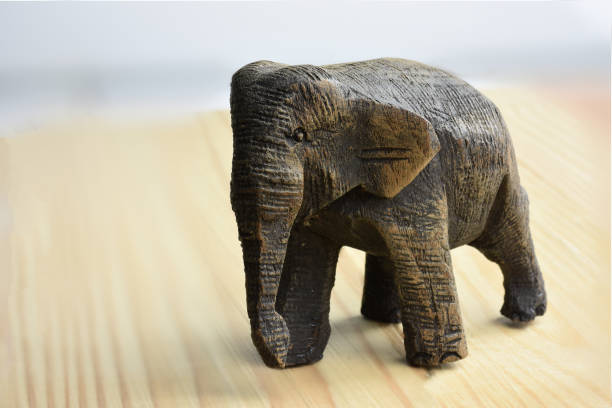 istock Wooden female elephant on wooden table 1325657543