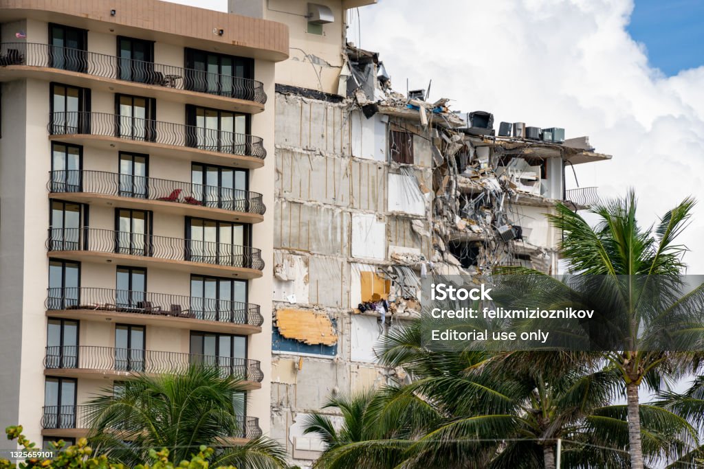 Champlain Towers remains 2 days after collapse owners personal belongings visible hanging from the units Miami Beach Surfside, FL, USA - June 26, 2021: Champlain Towers remains 2 days after collapse owners personal belongings visible hanging from the units Champlain Towers South Stock Photo