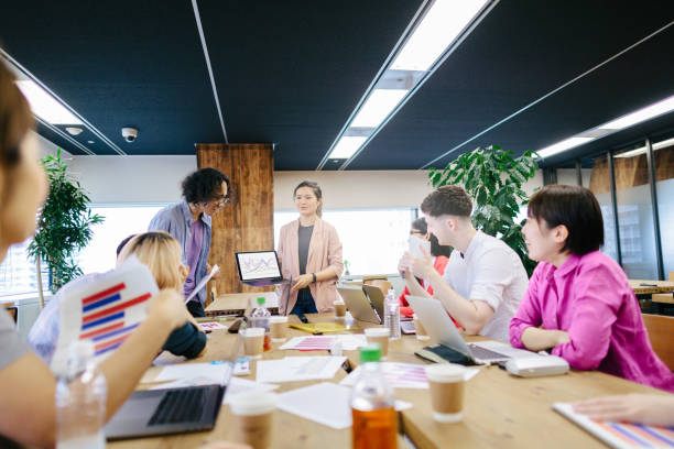 istock Young multi-ethnic business people working together 1325661606