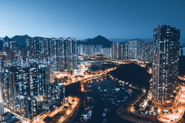 Residential District in Hong Kong at night Residential District in Hong Kong at night aircraft point of view photos stock pictures, royalty-free photos & images