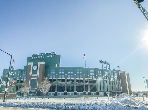 January 20, 2020 Green Bay, Wisconsin. Wiscon streets display their unique charm during this winter season. During the winter months there is still plenty of sights to enjoy. The architecture and charm, blanketed in the snows of winter, made for a delightful day.  Lambeau field sits at rest waiting for the next sporting event.