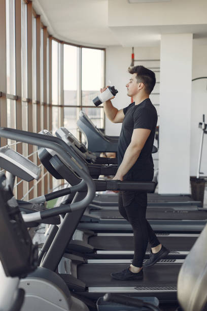 istock A handsome man is engaged in a gym 1325675064