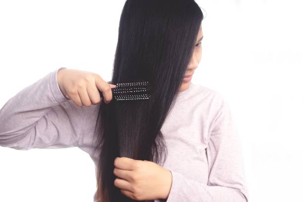 istock Women are allergic to shampoo causing hair loss and dandruff. 1325678007
