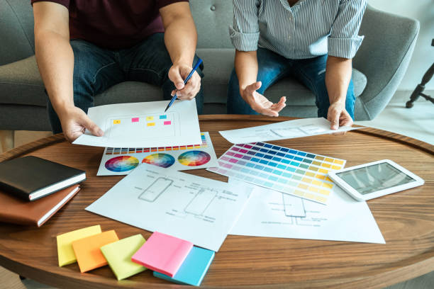 istock Team of Creative Web/Graphic Designer planning, drawing website ux app for mobile phone application and development template layout, process to developing prototype wireframe, User experience concept 1325683711