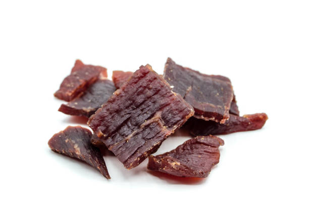 istock dried Jerky beef  meat isolated on white background 1325699796