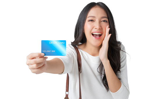 big tooth smile asian adult female casual cloth hand present credit card promotion hand gesture with happiness and cheerful expression isolate white background